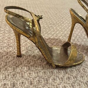 Worn once/twice. Manolo Blahnik gold/metallic crocodile leather heels. Size 35.
